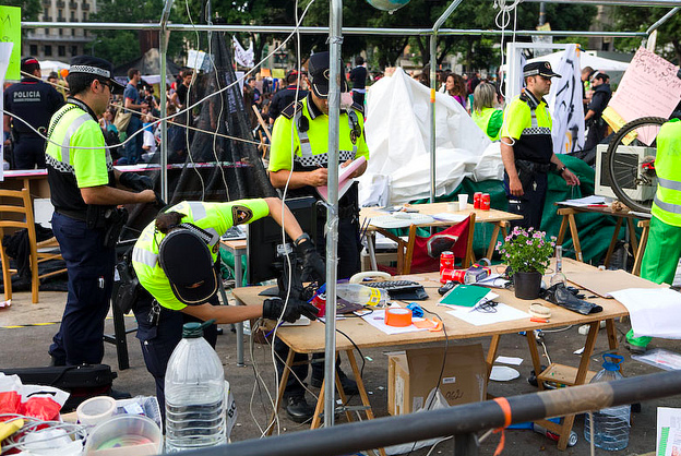 Police Clear Equipment from Plaza Catalunya, May, 2011: A media center had been set up in the plaza. As police cleared the area, they confiscated all the equipment.